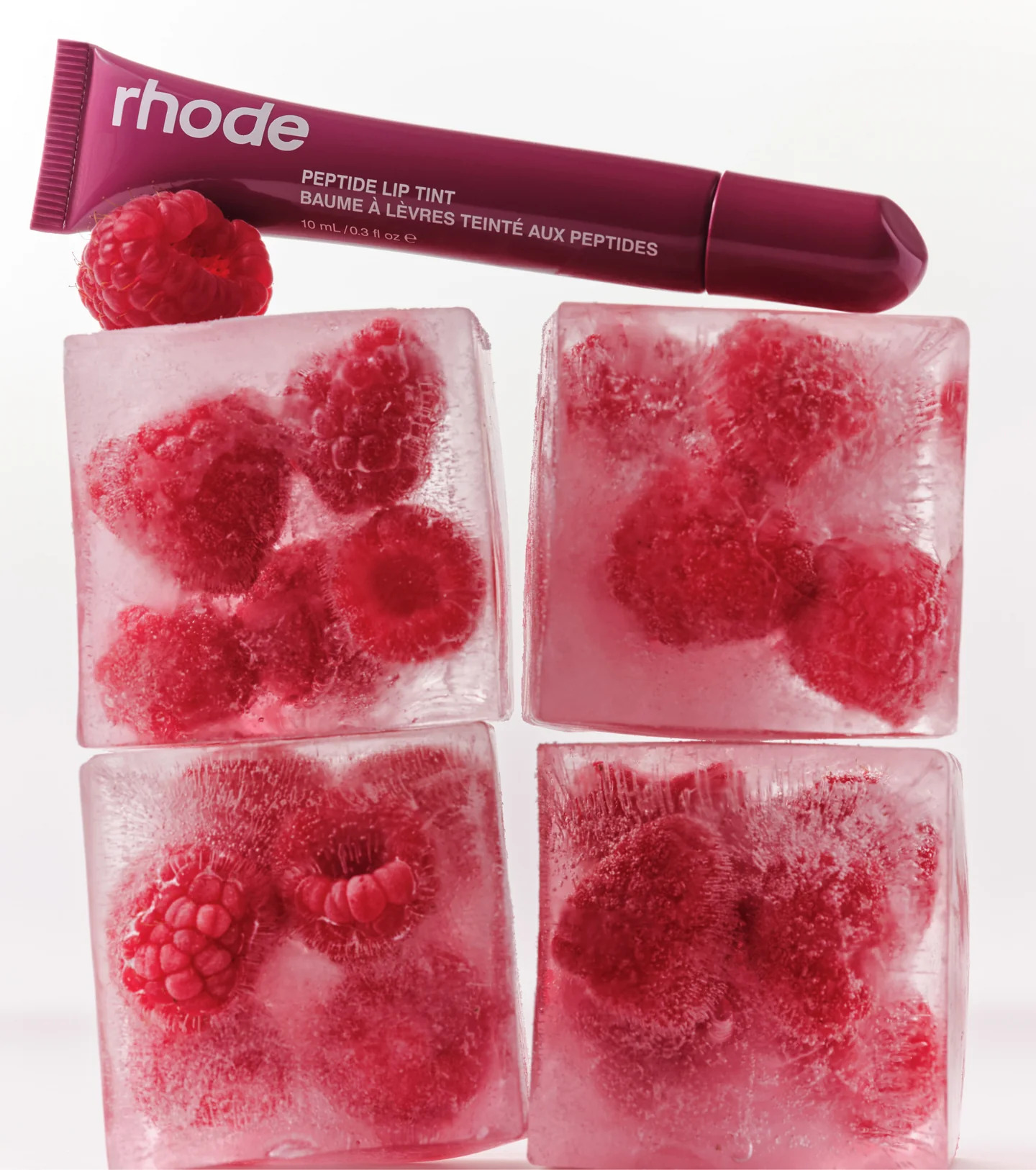Найтрендовіший тінт для вуст із пептидами RHODE RASPBERRY JELLY CRUSHED BERRY Peptide Lip Tint The Tinted Lip Layer